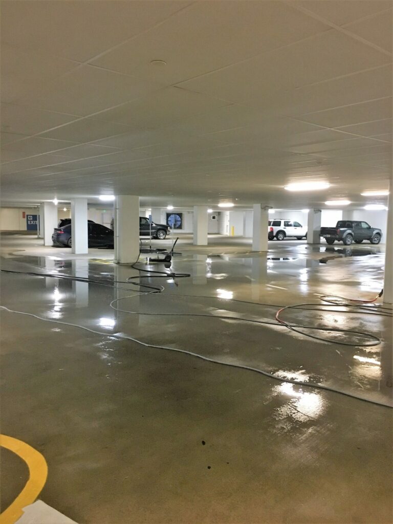 pressure washing parking garage for striping